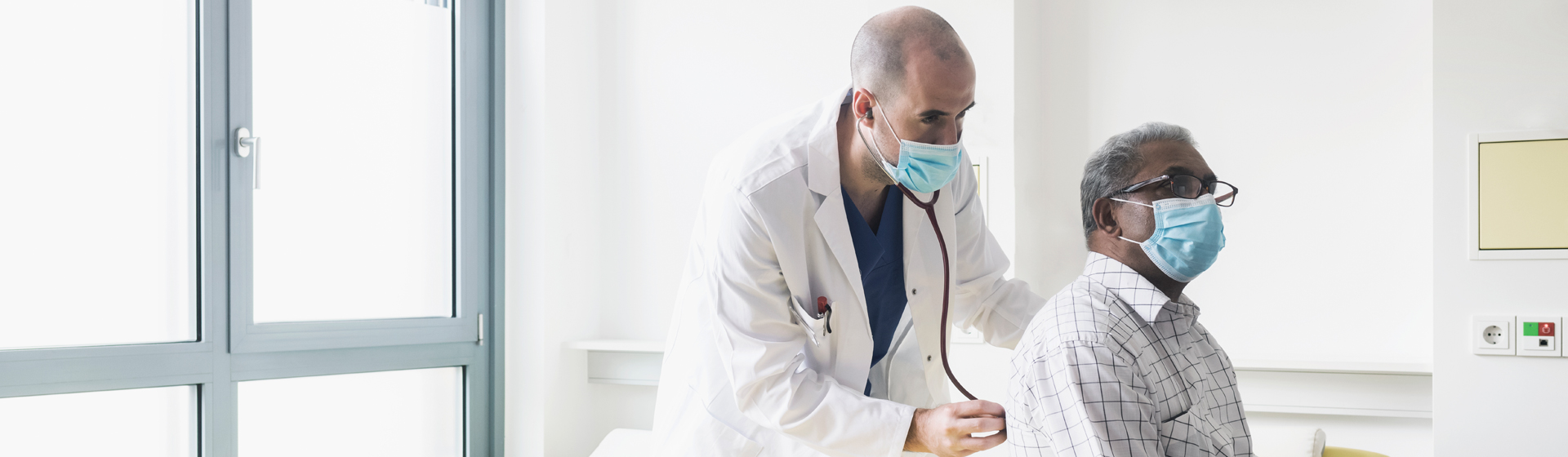 Hospitalist Doctor with Patient