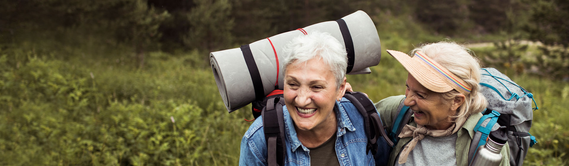 Two Senior Women Hiking Outdoors